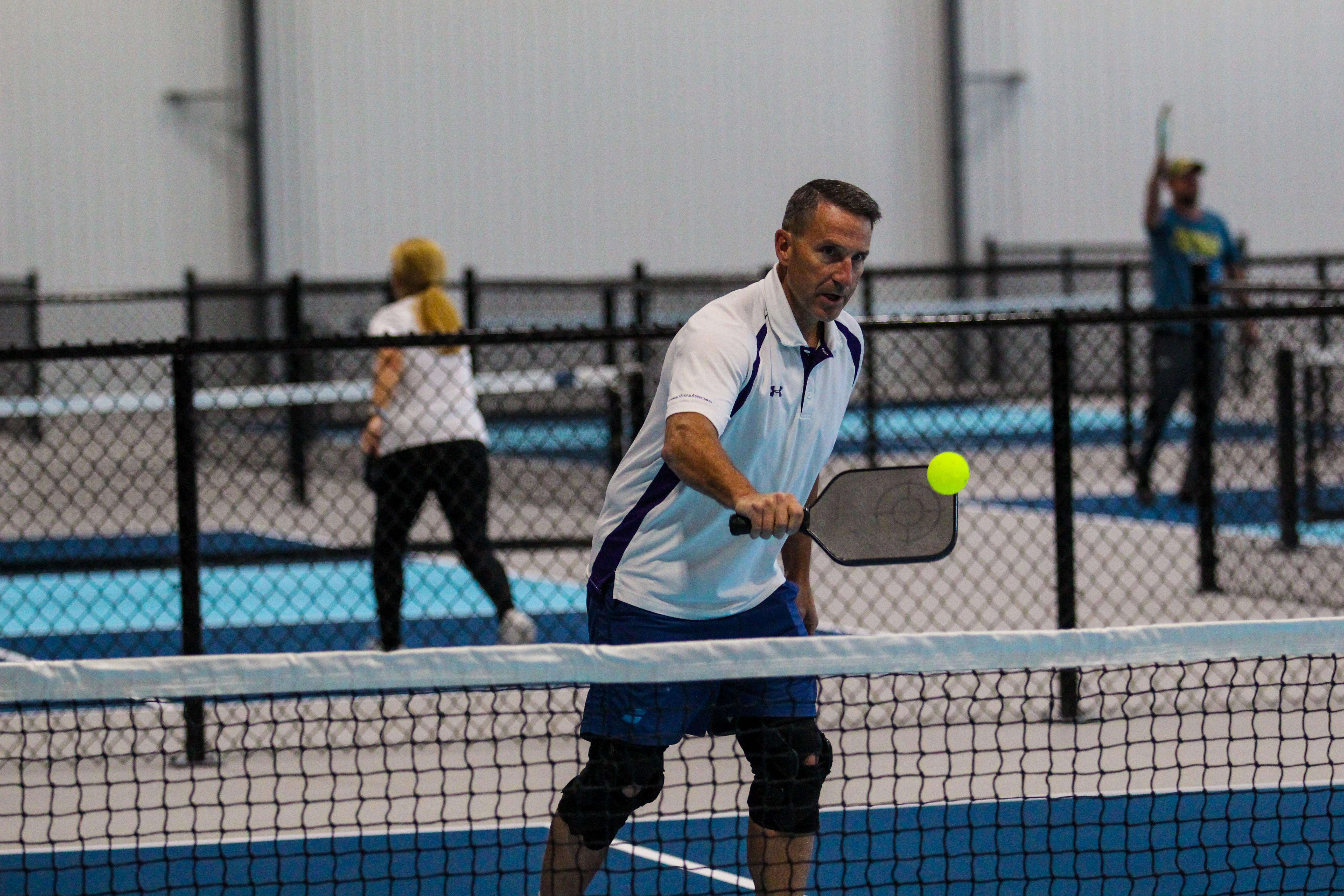 A player at the net at The Pickle Factory