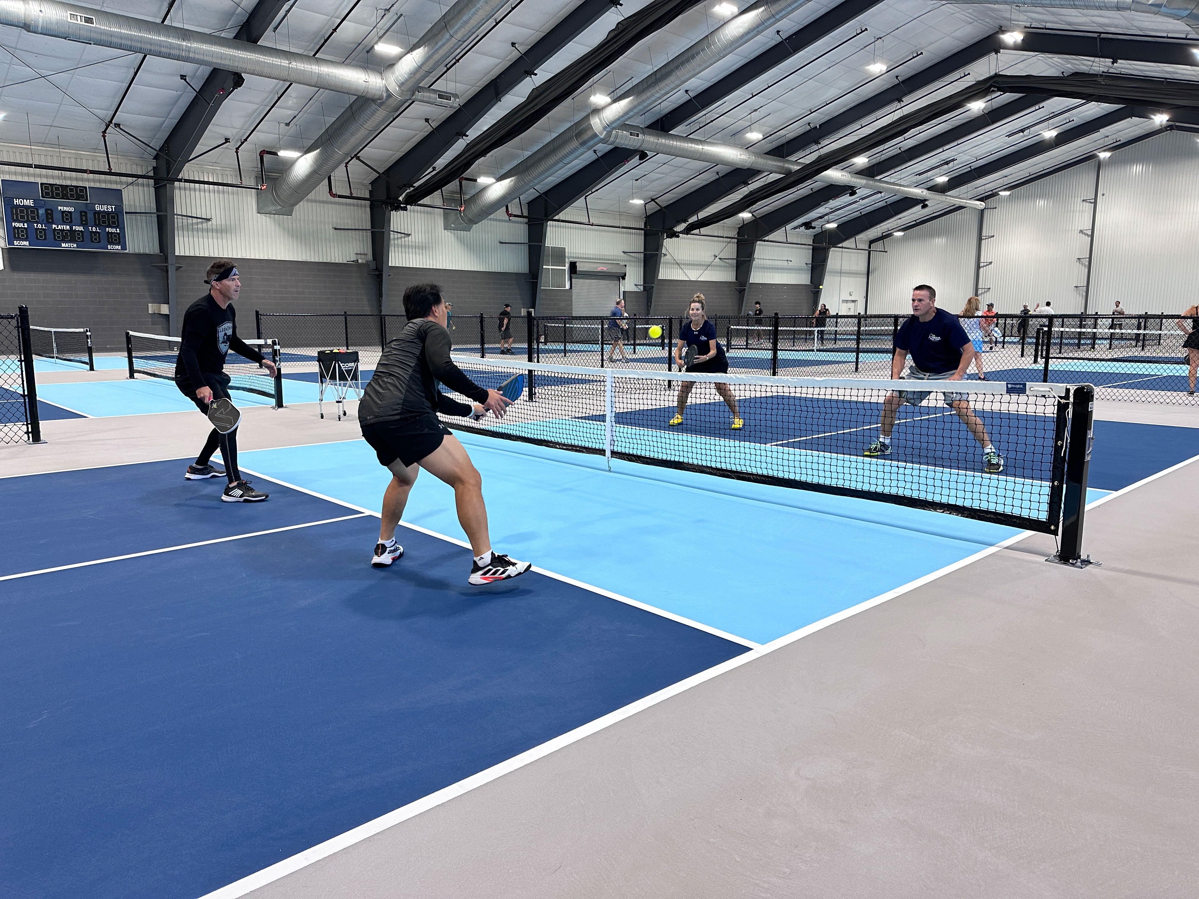 Players on the courts at The Pickle Factory